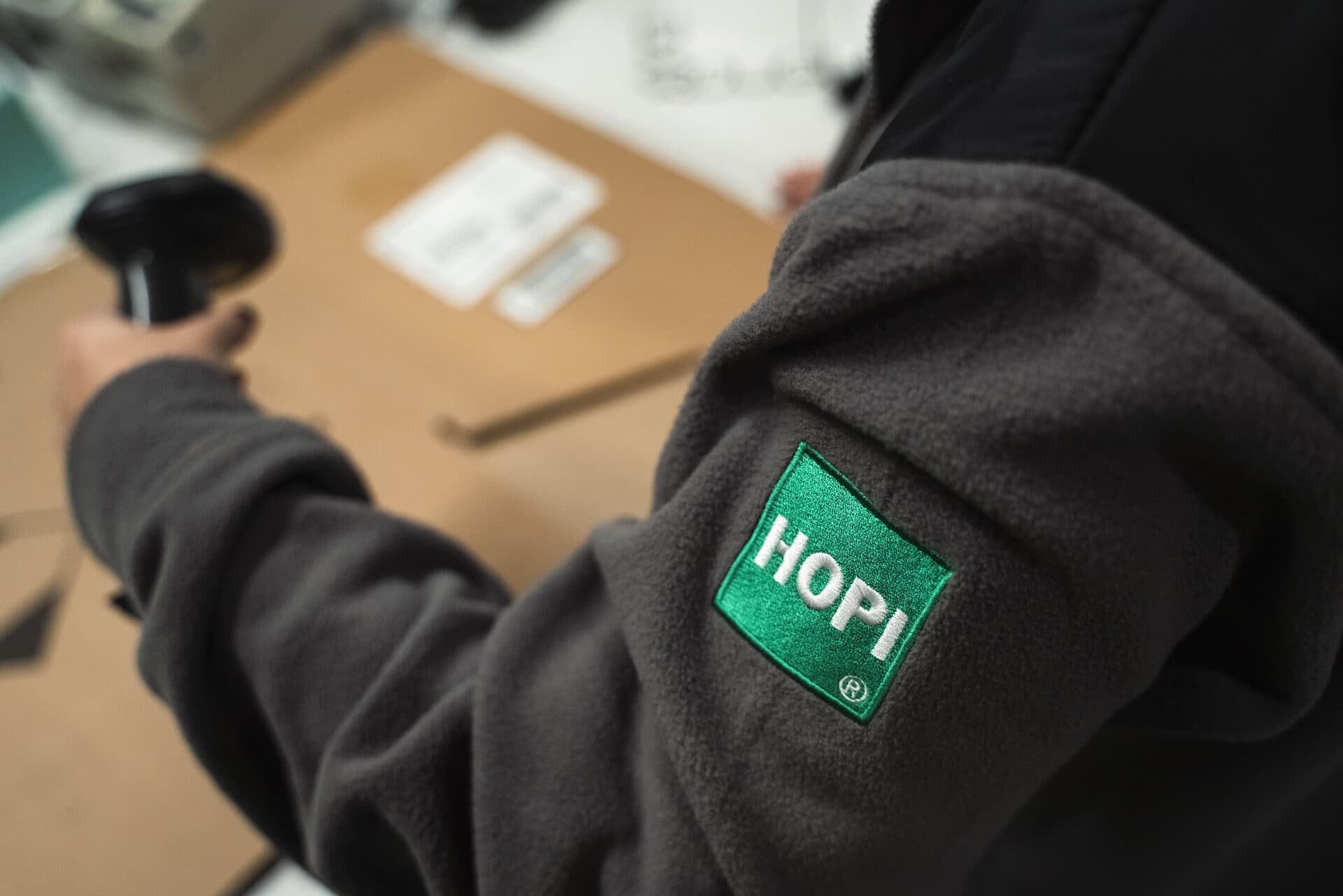HOPI colleague scanning a barcode during order preparation